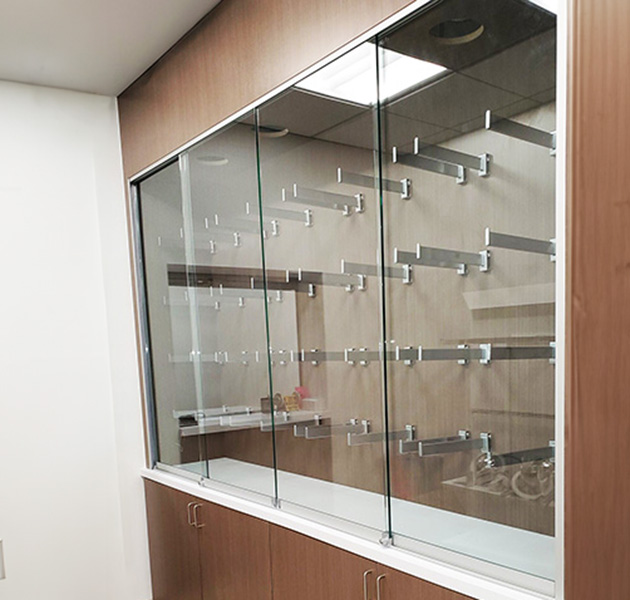 Chicago Glass Sliding Showcase Doors and Office Pass-Thru Windows